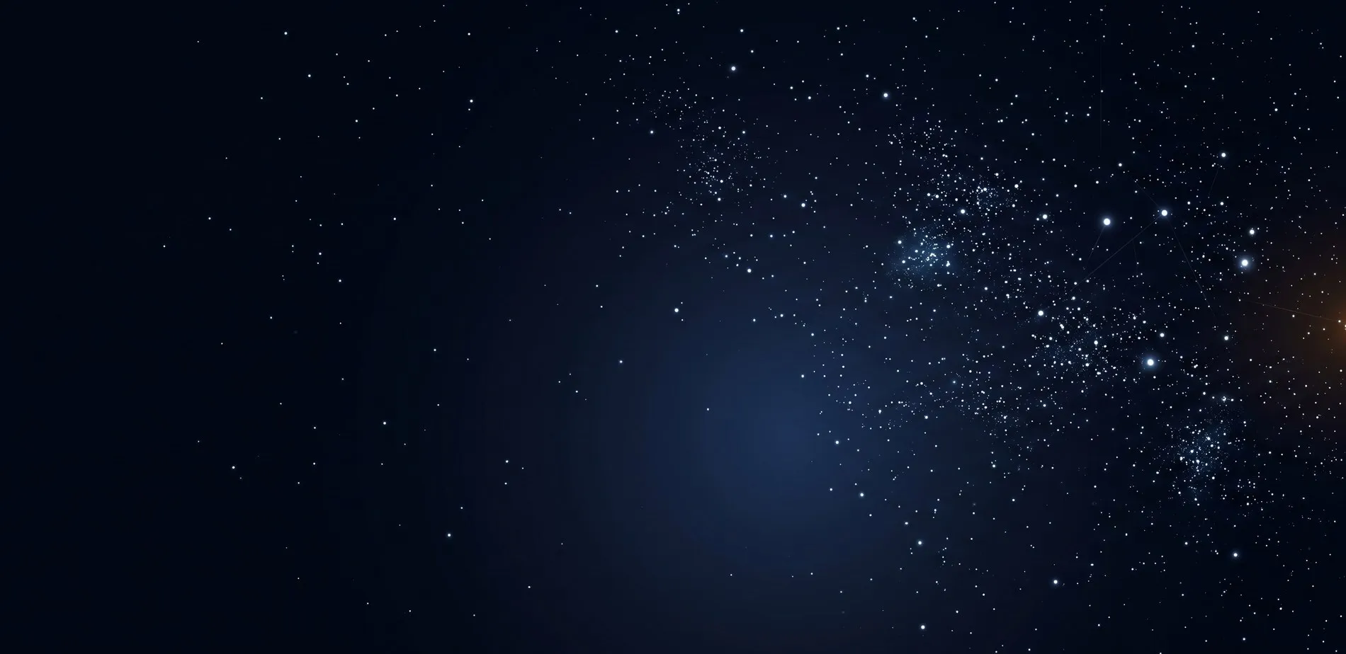 Scattered points of light gathering into brighter constellations against a deep blue field.